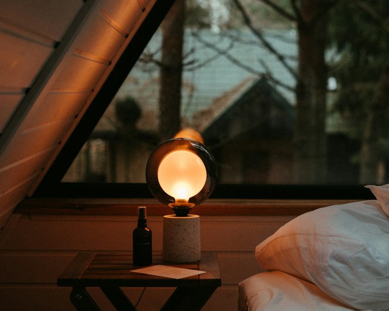Warm, lamp-lit bedroom offering emergency housing